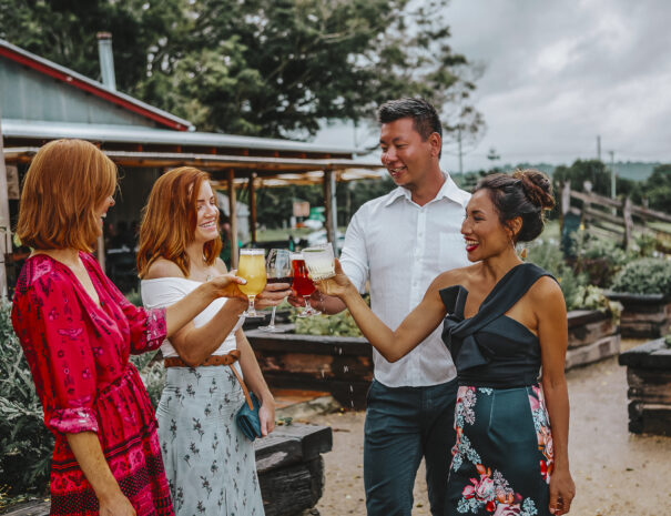 Friends enjoying a drink at The Farm, Byron Bay.