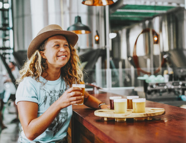 Woman beer tasting at Stone & Wood Brewing Company, Byron Bay.